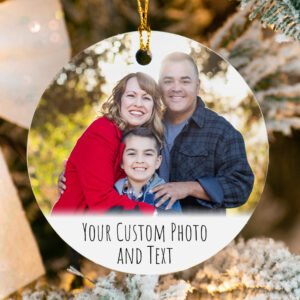 Round photo ornament with a family portrait on a Christmas tree background