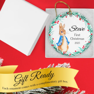 Bunny Boy ornament nestled in its gift-ready box with coordinating ribbon