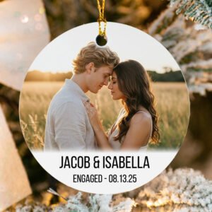 Circular photo of a couple embracing with 'Jacob & Isabella' and 'Engaged - 08.13.
