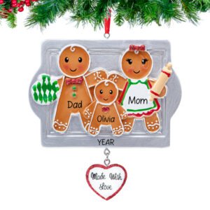 Gingerbread family ornament with 'Dad', 'Mom', and a child on a silver tray, 2024, with a heart tag 'Made With Love'.