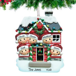 A personalized Christmas ornament featuring a decorated house with a family of five inside, including three children, with the ability to customize the names.