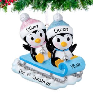 Round ornament with boy and girl twins design, personalized with names and year.